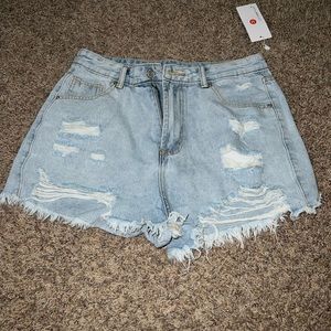 Ripped Jean shorts, light blue, (size medium)